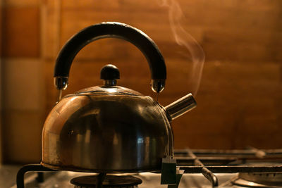 Close-up of electric lamp at home