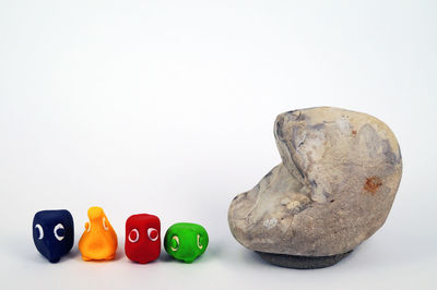 Close-up of multi colored pencils on white background