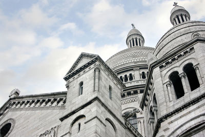 Low angle view of basilique du sacre coeur against sky