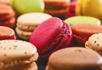 Full frame shot of colorful macaroons on table