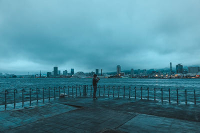 Scenic view of buildings in city against sky