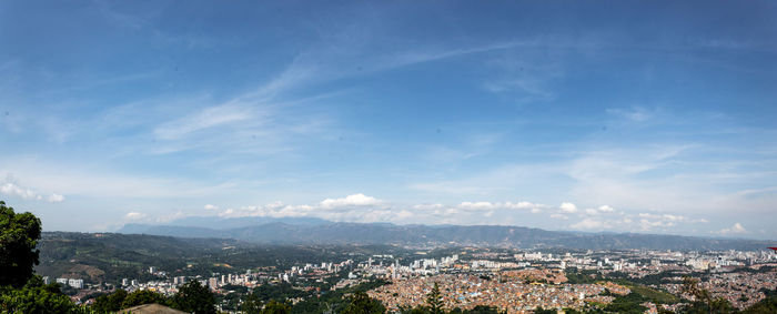 Aerial view of townscape against sky