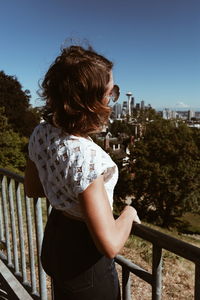 Beautiful woman standing in park