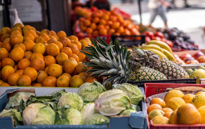 Side view with selective focus to fresh fruit in the greengrocer's market