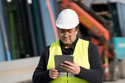 Close-up of man using mobile phone