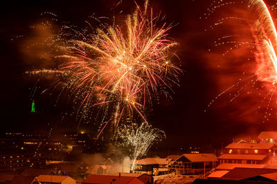 Firework display at night