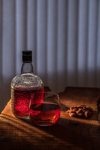 Close-up of wine glass on table