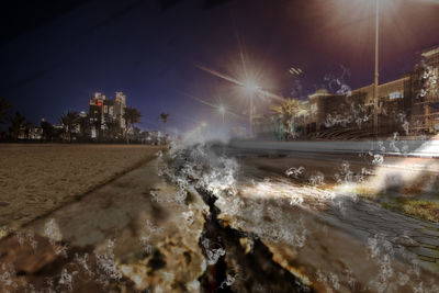 View of illuminated buildings at night