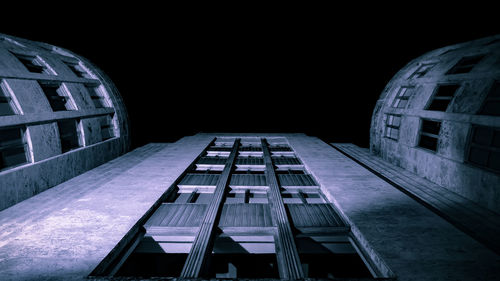 Low angle view of buildings at night