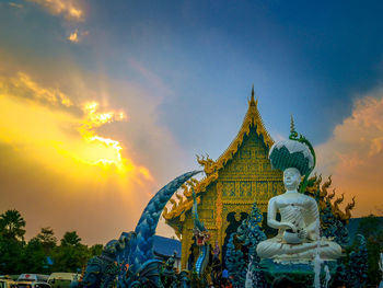 Statue against sky during sunset