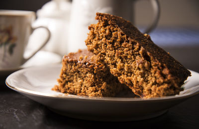 Close-up of slices of cake in plate on table