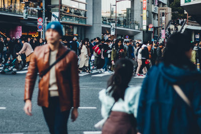 People walking on city street