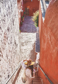 High angle view of bridge over canal amidst buildings in city