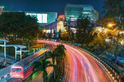 High angle view of light trails on road at night