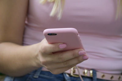 Close-up of man using mobile phone