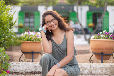 Happy young woman on a farm in the countryside