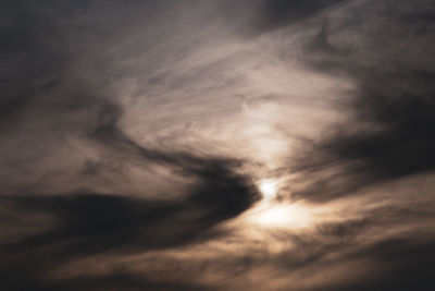 Low angle view of cloudy sky during sunset