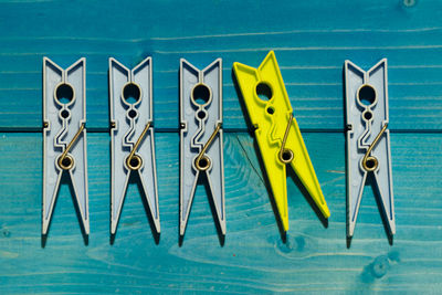 Overhead view of clothespins on table