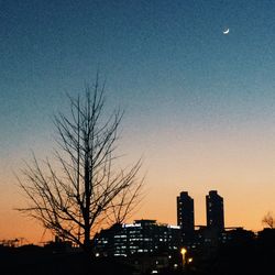 Low angle view of buildings at sunset