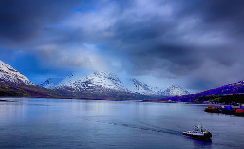 Scenic view of sea against sky during winter