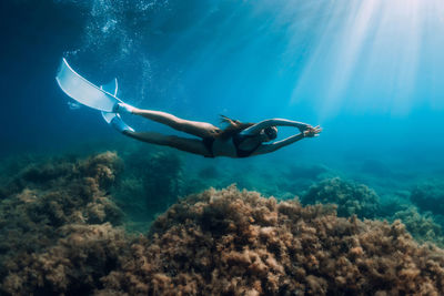 Man swimming in sea