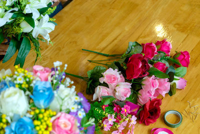 High angle view of pink roses on table