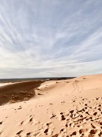 Scenic view of beach against sky