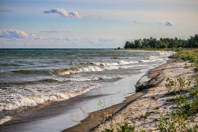 Scenic view of beach against sky