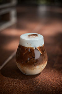 Close-up of beer glass on table