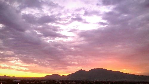 Scenic view of mountains at sunset