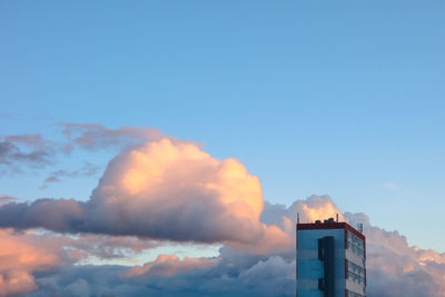 Low angle view of built structure against blue sky