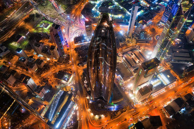 High angle view of illuminated city street at night