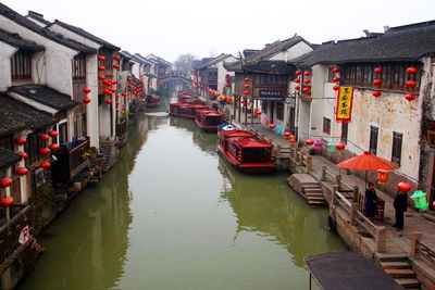 View of canal along buildings