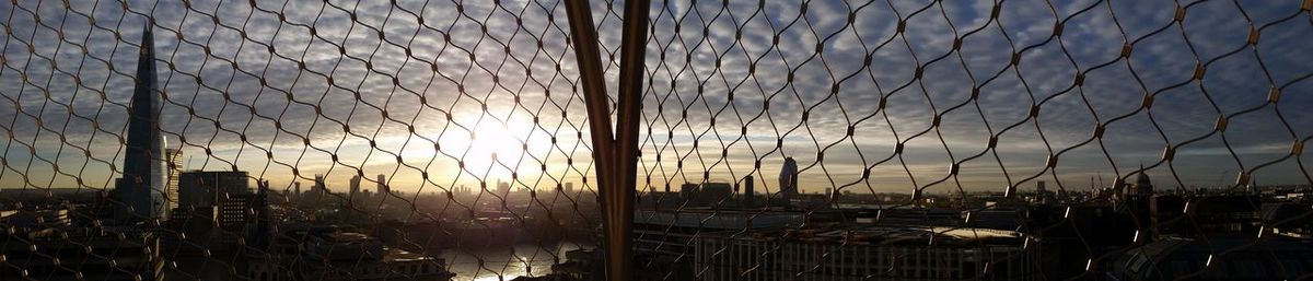 Cityscape against sky during sunset