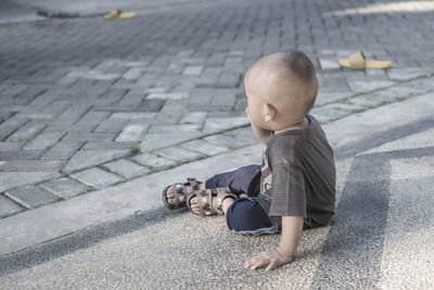 Full length of cute baby girl on street in village