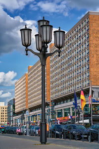 Low angle view of street light against sky