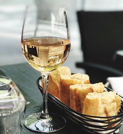 Close-up of wine in glass on table