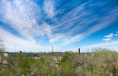 Scenic view of landscape against blue sky