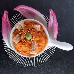 Directly above shot of ice cream in bowl on table