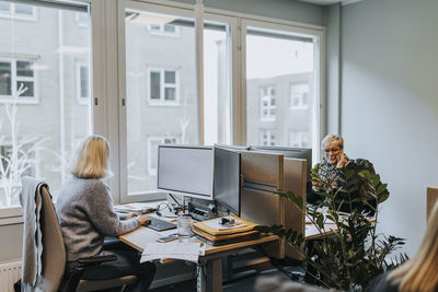 Women sitting at desk in office