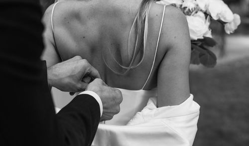 Low section of woman exercising at home