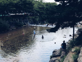 People in river