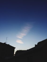 Low angle view of building against blue sky