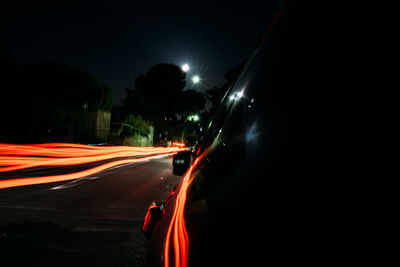 Light trails on road at night