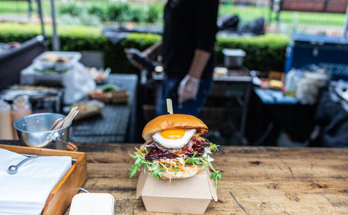 Man preparing food on table