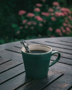 Close-up of coffee cup on table