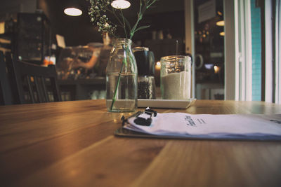 Close-up of flower in jar on table