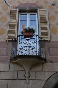 Low angle view of house window