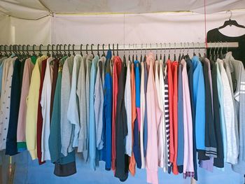 Clothes hanging on rack