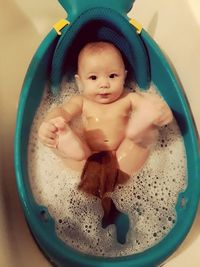 High angle view of cute baby girl